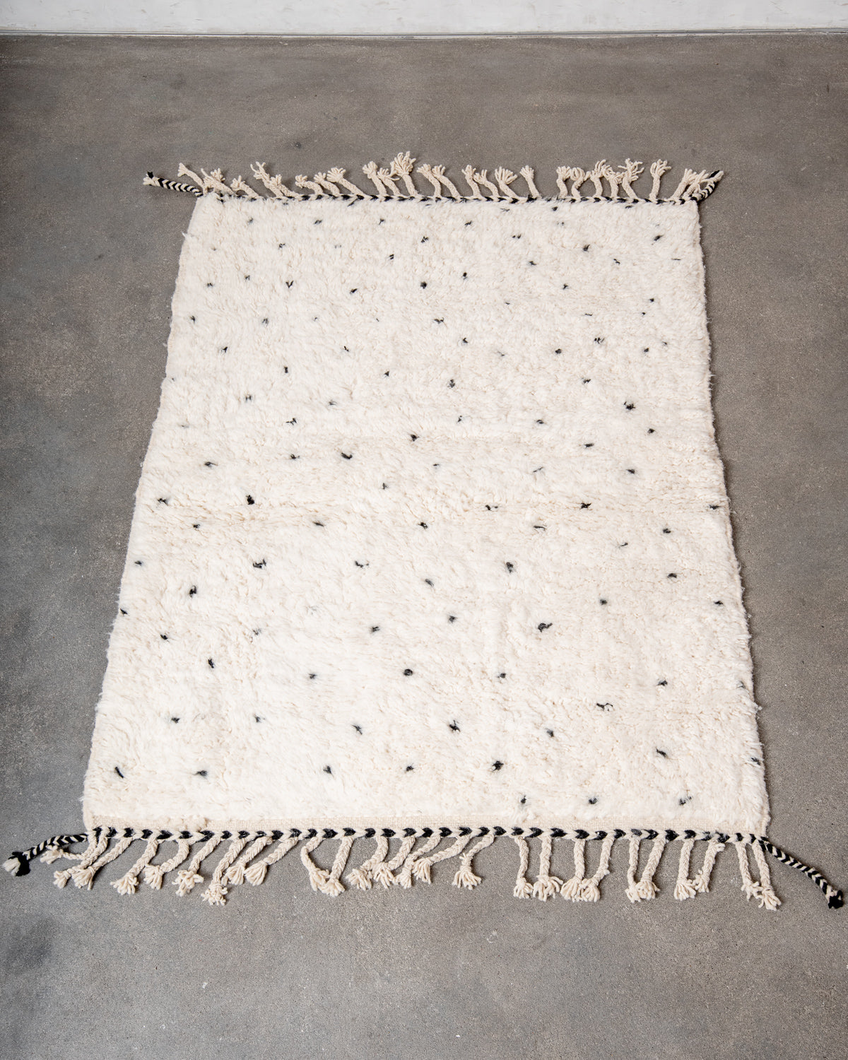 Modern, designer, handcrafted Berber rug from Morocco. Beniourain carpet with beautiful colours and patterns and fluffy wool texture.